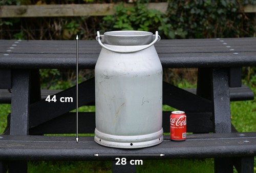 Vintage old aluminium milk