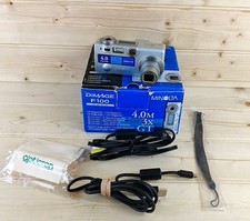 Minolta Dimage F100 4.0MP Compact Digital Camera Silver With Box, Cables ETC