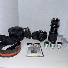 Nikon EM 35mm SLR w/50mm 1:8 E