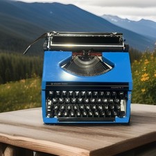 Vintage Silver Reed Silverette II Blue Typewriter with new ribbon 