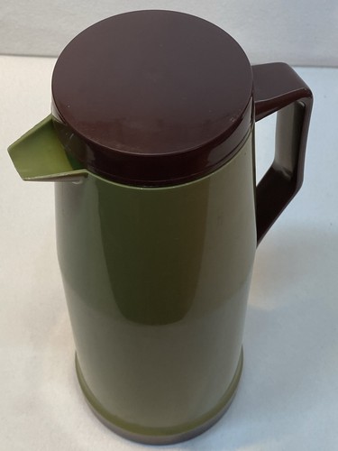 Vintage retro thermos pouring - thermos,