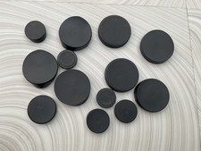 13 x binocular lens covers.