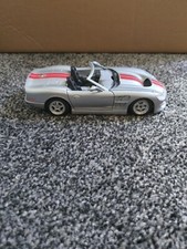 Burago Shelby Series 1 Diecast Model Scale 1/24 Grey /Red Stripes 