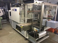 Adpak B700 Side Feed Automatic Sleeve Sealer and Tunnel.