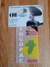 2 Phonecards Of TOGO, AFRICA. A LARGE SATELLITE DISH & MAP OF AFRICA.