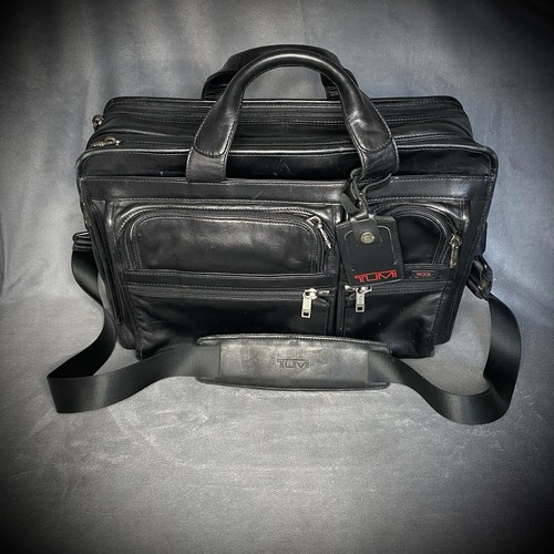 Tumi black leather - tumi,