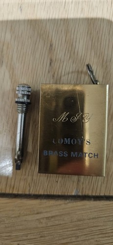 Vintage comoys brass match - brass,