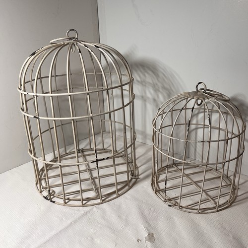 Distressed white metal bird - distressed,