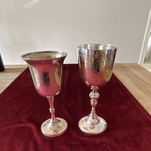 Pair floral engraved silver - of,