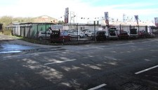 Photo 6x4 Yspitty Service Station perimeter fence, Bynea Viewed across th c2016