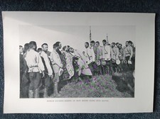Russian soldiers before going into battle kissing an icon, vintage,old print