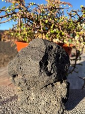 One Large, Black Lava Rock –