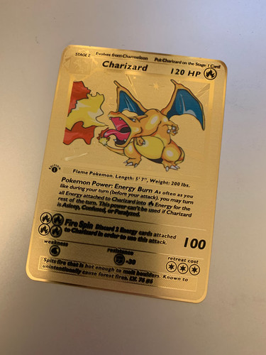Metal gold charizard pokémon - gold,