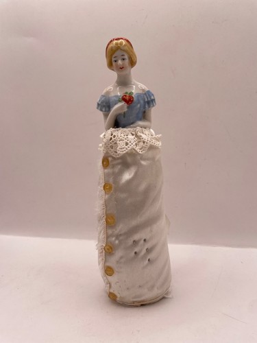 Half doll porcelain pin