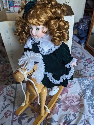 Porcelain doll with wooden
