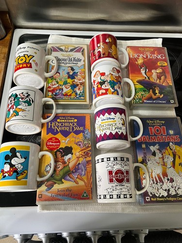 Disney mugs and vhs - mugs,