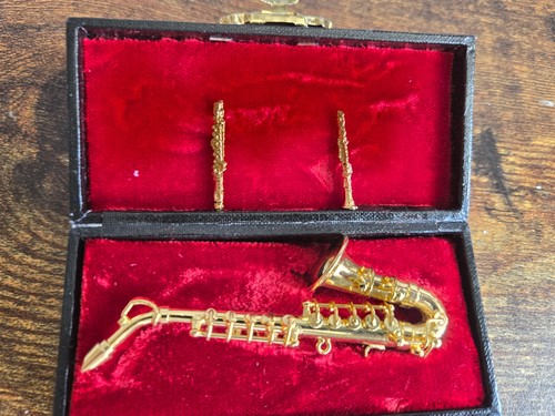 Doll house emporium - doll, saxophone