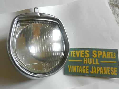 Suzuki k10p headlamp glass - suzuki,