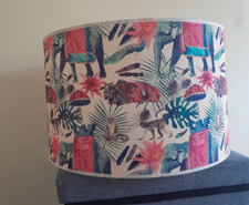 Lovely whacky jungle themed light shade in shades of pink and blue.