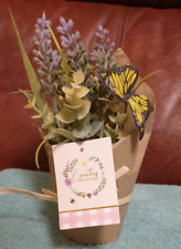 Country meadow artificial flowers,  2 butterflies in paper covered pot