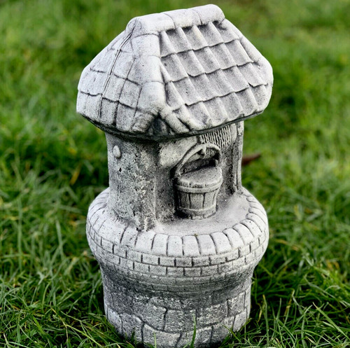 Wishing well figurine for