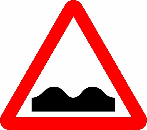 Uneven road safety sign - uneven,