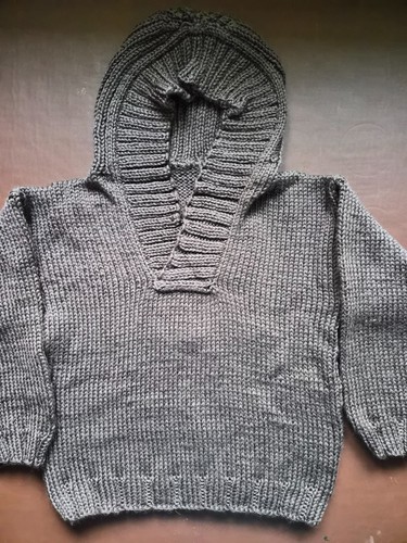 Childs hand knitted donkey - hand,