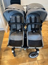 Double baby and toddler pram
