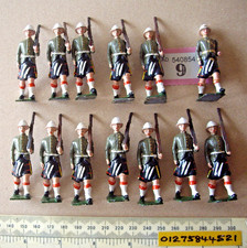 1950s Britains Hollow-cast Kilted Highlanders x 13. Tropical Service Helmets