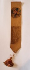 Rare vintage tooled leather 'LAWS DIE, BOOKS NEVER' bird bookmark bookmarker