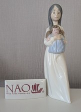 Nao Figurine by Lladro GIRL WITH DOLL