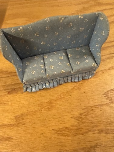 Floral high back doll - back, couch