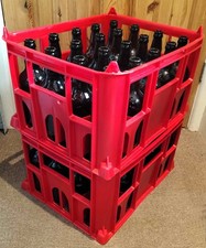 2 strong beer crates each filled with 20 identical 500ml glass beer bottles