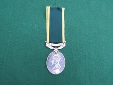 TERRITORIAL EFFICIENT SERVICE MEDAL TO 6895960 RFN R. F. FLEMING K.R.R.C.