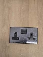 Crabtree Polished Brass Black Interior Double Switched Socket 13A