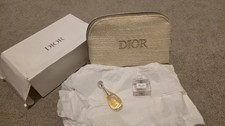 Dior Golden Pouch and Miss