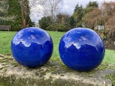 PAIR OF BLUE GLAZED TERRACOTTA
