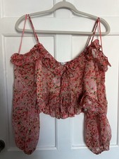 Ruffle Cold Shoulder Top In