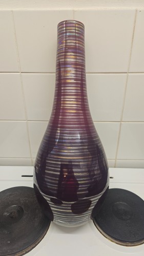 Next purple vase with - , mirror