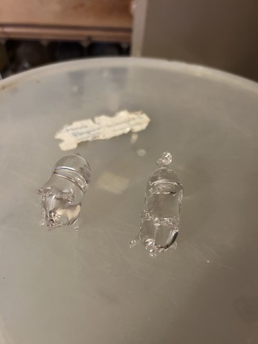 Two glass pigs - two,