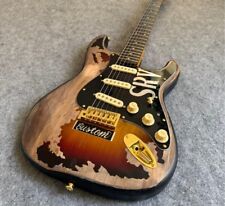 Aged log electric guitars