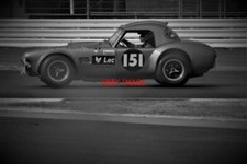 PHOTO  SILVERSTONE THE YATES/TWYMAN AC COBRA DIPS UNDER BRAKING FOR BROOKLANDS I