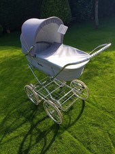 Moses basket and Silvercross Pram