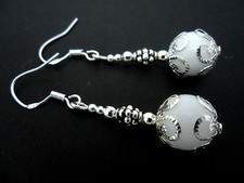 A PAIR OF DANGLY WHITE JADE