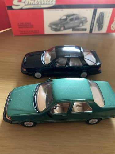 Saab white metal car - 1/43,