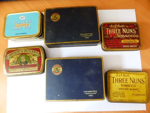 Empty cigarette tobacco tins - cigarette/tobacco,