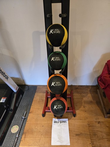 Medicine balls and - balls, rack.