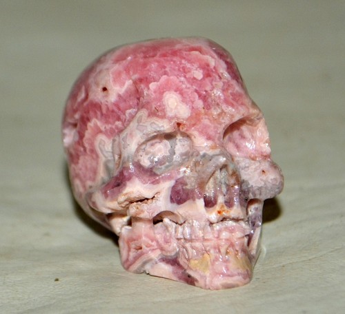 Rhodochrosite carved skull - rhodochrosite,