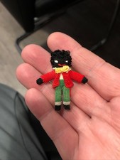 Rare vintage miniature knitted black doll