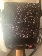 Quicksilver Mans Crossbody Bag With An Adjustable Strap.